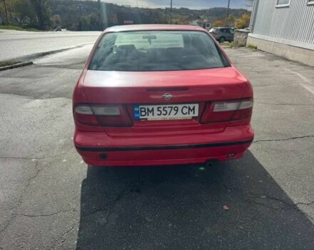 Червоний Ніссан Альмера, об'ємом двигуна 1.4 л та пробігом 250 тис. км за 1500 $, фото 1 на Automoto.ua