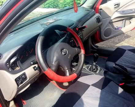 Червоний Ніссан Альмера, об'ємом двигуна 1.5 л та пробігом 0 тис. км за 2700 $, фото 5 на Automoto.ua