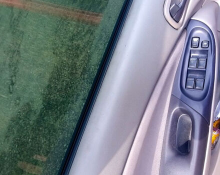 Червоний Ніссан Альмера, об'ємом двигуна 1.5 л та пробігом 0 тис. км за 2700 $, фото 6 на Automoto.ua