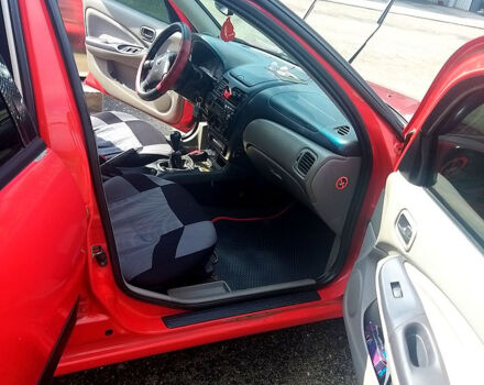 Червоний Ніссан Альмера, об'ємом двигуна 1.5 л та пробігом 0 тис. км за 2700 $, фото 7 на Automoto.ua