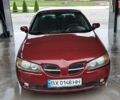 Красный Ниссан Альмера, объемом двигателя 1.5 л и пробегом 231 тыс. км за 3100 $, фото 1 на Automoto.ua