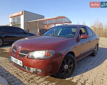 Красный Ниссан Альмера, объемом двигателя 1.5 л и пробегом 253 тыс. км за 2500 $, фото 4 на Automoto.ua