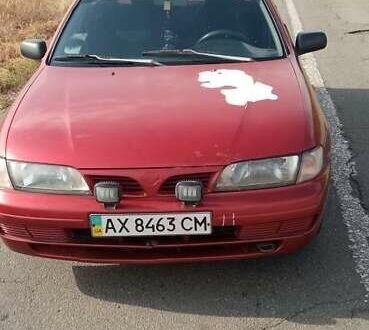 Красный Ниссан Альмера, объемом двигателя 1.4 л и пробегом 300 тыс. км за 1204 $, фото 1 на Automoto.ua