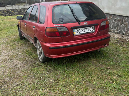 Красный Ниссан Альмера, объемом двигателя 1.4 л и пробегом 250 тыс. км за 860 $, фото 1 на Automoto.ua