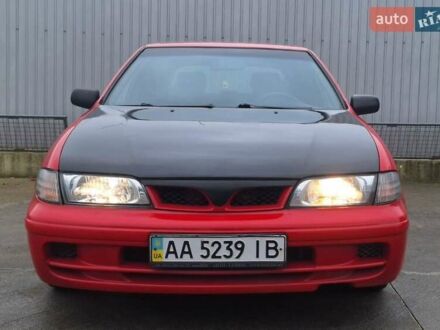 Красный Ниссан Альмера, объемом двигателя 1.39 л и пробегом 29 тыс. км за 2250 $, фото 1 на Automoto.ua