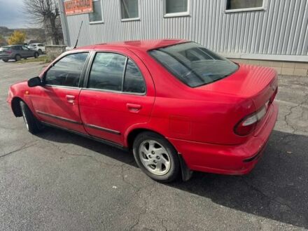 Червоний Ніссан Альмера, об'ємом двигуна 1.4 л та пробігом 250 тис. км за 1500 $, фото 1 на Automoto.ua