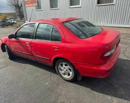 Червоний Ніссан Альмера, об'ємом двигуна 1.4 л та пробігом 250 тис. км за 1500 $, фото 1 на Automoto.ua