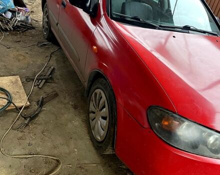 Красный Ниссан Альмера, объемом двигателя 1.5 л и пробегом 250 тыс. км за 1650 $, фото 1 на Automoto.ua