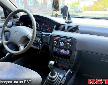 Ніссан Альмера, об'ємом двигуна 1.6 л та пробігом 240 тис. км за 3100 $, фото 10 на Automoto.ua