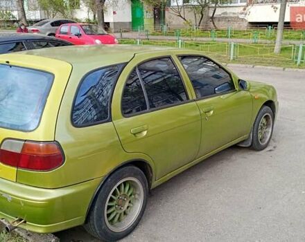 Желтый Ниссан Альмера, объемом двигателя 1.4 л и пробегом 140 тыс. км за 1750 $, фото 6 на Automoto.ua