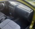 Желтый Ниссан Альмера, объемом двигателя 1.4 л и пробегом 140 тыс. км за 1750 $, фото 4 на Automoto.ua