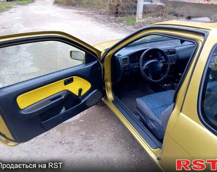 Жовтий Ніссан Альмера, об'ємом двигуна 1.4 л та пробігом 280 тис. км за 2700 $, фото 2 на Automoto.ua