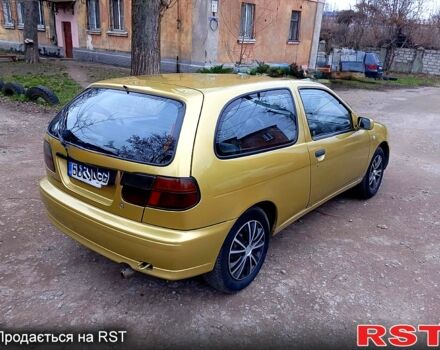 Жовтий Ніссан Альмера, об'ємом двигуна 1.4 л та пробігом 280 тис. км за 2700 $, фото 3 на Automoto.ua