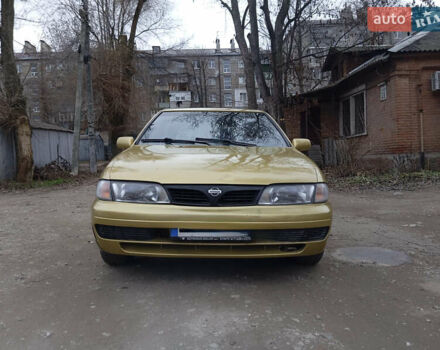 Желтый Ниссан Альмера, объемом двигателя 1.4 л и пробегом 280 тыс. км за 2700 $, фото 1 на Automoto.ua