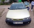Желтый Ниссан Альмера, объемом двигателя 14 л и пробегом 310 тыс. км за 1800 $, фото 4 на Automoto.ua