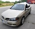 Желтый Ниссан Альмера, объемом двигателя 1.5 л и пробегом 250 тыс. км за 2500 $, фото 2 на Automoto.ua