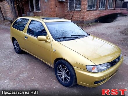 Жовтий Ніссан Альмера, об'ємом двигуна 1.4 л та пробігом 280 тис. км за 2700 $, фото 1 на Automoto.ua