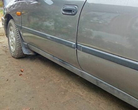 Сірий Ніссан Альмера, об'ємом двигуна 1.6 л та пробігом 100 тис. км за 1200 $, фото 3 на Automoto.ua