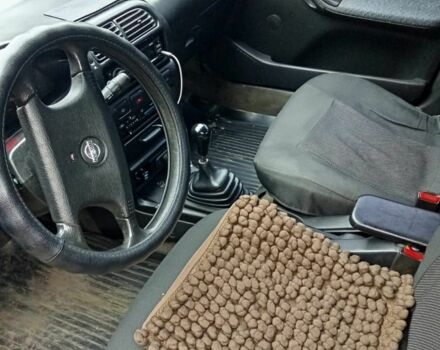 Сірий Ніссан Альмера, об'ємом двигуна 1.6 л та пробігом 100 тис. км за 1200 $, фото 4 на Automoto.ua