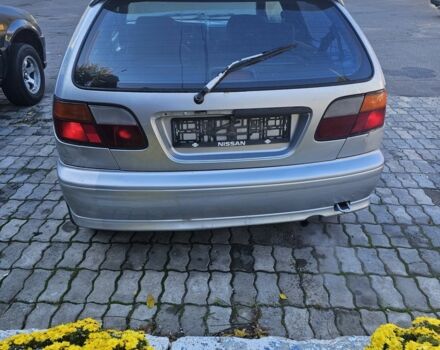 Серый Ниссан Альмера, объемом двигателя 1.6 л и пробегом 320 тыс. км за 650 $, фото 1 на Automoto.ua