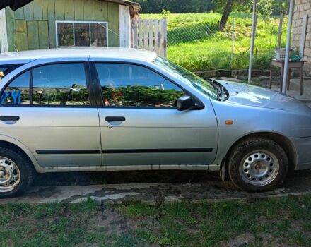 Сірий Ніссан Альмера, об'ємом двигуна 1.4 л та пробігом 271 тис. км за 1800 $, фото 1 на Automoto.ua