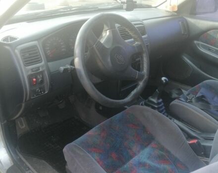 Серый Ниссан Альмера, объемом двигателя 1.6 л и пробегом 247 тыс. км за 950 $, фото 3 на Automoto.ua