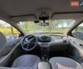 Сірий Ніссан Альмера, об'ємом двигуна 2 л та пробігом 205 тис. км за 3800 $, фото 4 на Automoto.ua
