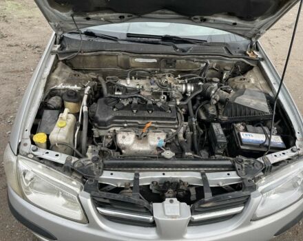 Серый Ниссан Альмера, объемом двигателя 1.8 л и пробегом 202 тыс. км за 2100 $, фото 10 на Automoto.ua