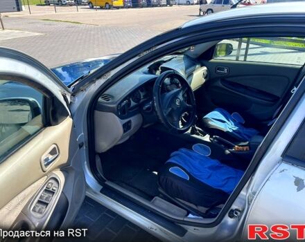 Серый Ниссан Альмера, объемом двигателя 2.2 л и пробегом 371 тыс. км за 1080 $, фото 6 на Automoto.ua