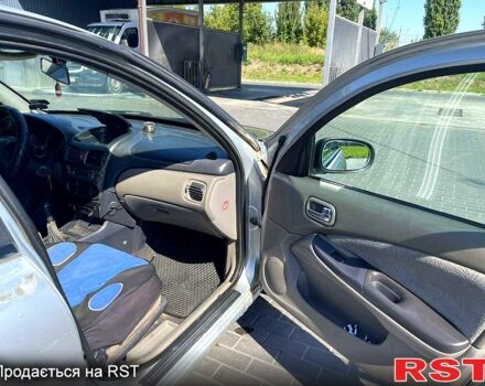 Серый Ниссан Альмера, объемом двигателя 2.2 л и пробегом 371 тыс. км за 1080 $, фото 4 на Automoto.ua