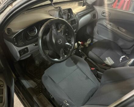 Серый Ниссан Альмера, объемом двигателя 0 л и пробегом 100 тыс. км за 500 $, фото 4 на Automoto.ua