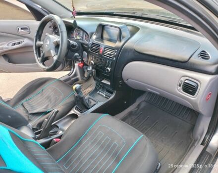 Серый Ниссан Альмера, объемом двигателя 1.5 л и пробегом 247 тыс. км за 3200 $, фото 6 на Automoto.ua