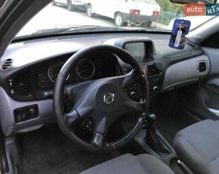 Сірий Ніссан Альмера, об'ємом двигуна 1.5 л та пробігом 292 тис. км за 3700 $, фото 4 на Automoto.ua