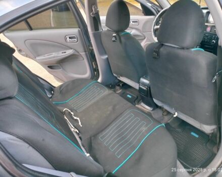 Серый Ниссан Альмера, объемом двигателя 1.5 л и пробегом 247 тыс. км за 3200 $, фото 7 на Automoto.ua