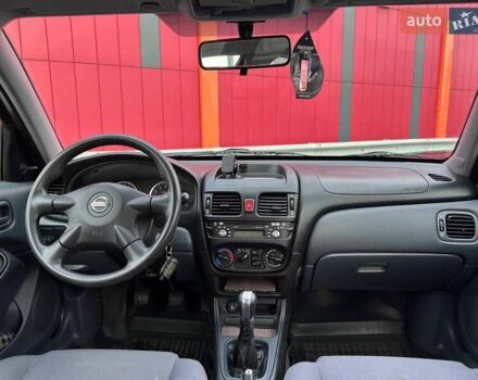 Сірий Ніссан Альмера, об'ємом двигуна 1.5 л та пробігом 204 тис. км за 4690 $, фото 12 на Automoto.ua
