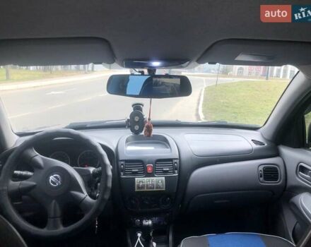 Сірий Ніссан Альмера, об'ємом двигуна 1.5 л та пробігом 245 тис. км за 4500 $, фото 5 на Automoto.ua