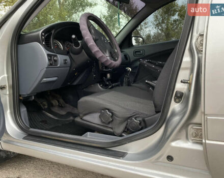 Серый Ниссан Альмера, объемом двигателя 1.5 л и пробегом 256 тыс. км за 4350 $, фото 8 на Automoto.ua