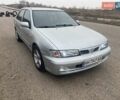 Серый Ниссан Альмера, объемом двигателя 1.4 л и пробегом 235 тыс. км за 2000 $, фото 1 на Automoto.ua