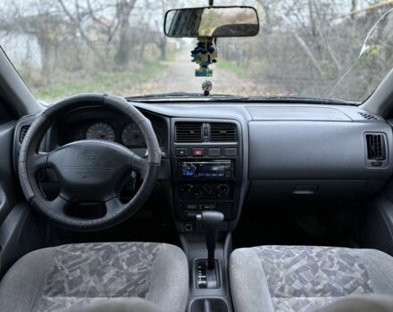 Серый Ниссан Альмера, объемом двигателя 1.6 л и пробегом 100 тыс. км за 1400 $, фото 10 на Automoto.ua