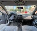 Сірий Ніссан Альмера, об'ємом двигуна 1.4 л та пробігом 248 тис. км за 2500 $, фото 3 на Automoto.ua