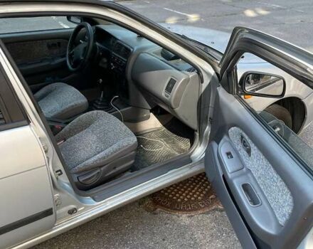 Сірий Ніссан Альмера, об'ємом двигуна 1.4 л та пробігом 248 тис. км за 2500 $, фото 1 на Automoto.ua