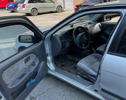 Сірий Ніссан Альмера, об'ємом двигуна 1.4 л та пробігом 248 тис. км за 2500 $, фото 2 на Automoto.ua