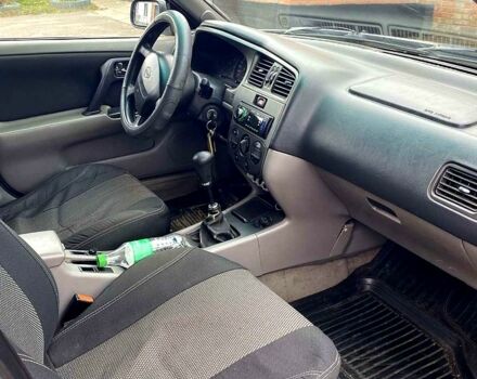 Серый Ниссан Альмера, объемом двигателя 2 л и пробегом 205 тыс. км за 2290 $, фото 6 на Automoto.ua