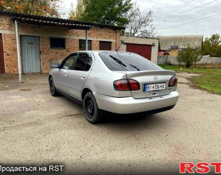 Серый Ниссан Альмера, объемом двигателя 2 л и пробегом 205 тыс. км за 2290 $, фото 3 на Automoto.ua