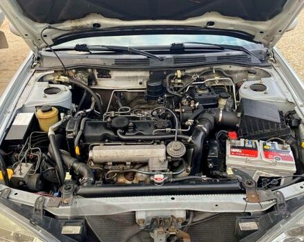 Серый Ниссан Альмера, объемом двигателя 2 л и пробегом 205 тыс. км за 2290 $, фото 9 на Automoto.ua