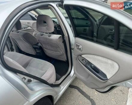 Серый Ниссан Альмера, объемом двигателя 1.8 л и пробегом 372 тыс. км за 2600 $, фото 10 на Automoto.ua