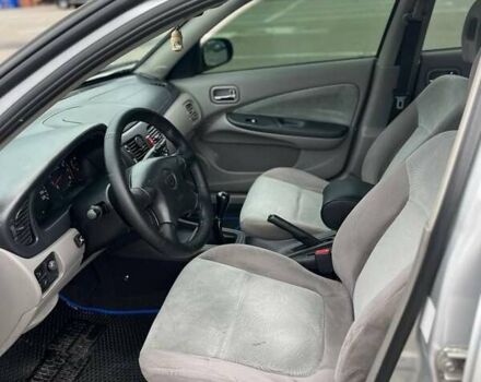 Серый Ниссан Альмера, объемом двигателя 1.8 л и пробегом 372 тыс. км за 2600 $, фото 5 на Automoto.ua