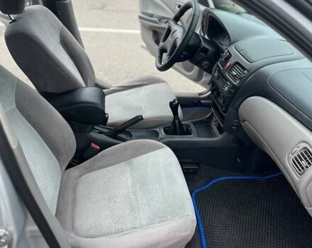 Серый Ниссан Альмера, объемом двигателя 1.8 л и пробегом 372 тыс. км за 2600 $, фото 7 на Automoto.ua