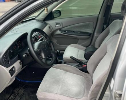 Серый Ниссан Альмера, объемом двигателя 1.8 л и пробегом 350 тыс. км за 2600 $, фото 7 на Automoto.ua