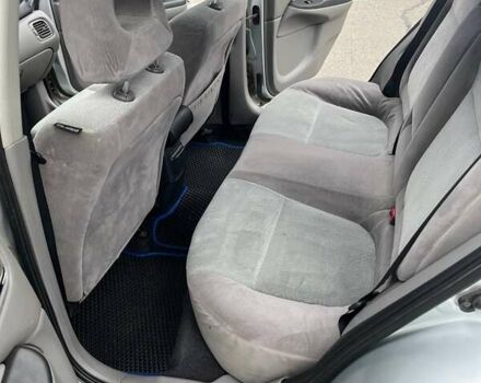 Серый Ниссан Альмера, объемом двигателя 1.8 л и пробегом 372 тыс. км за 2600 $, фото 12 на Automoto.ua